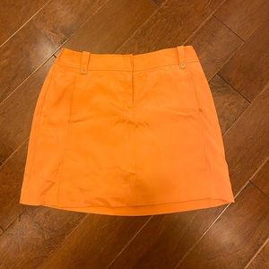 Orange izod golf skirt